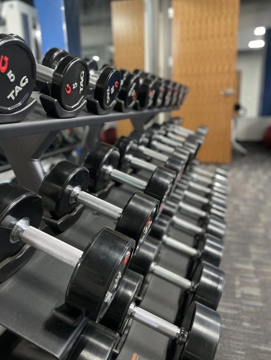 A rack of TAG dumbbells at PKFit Madison East