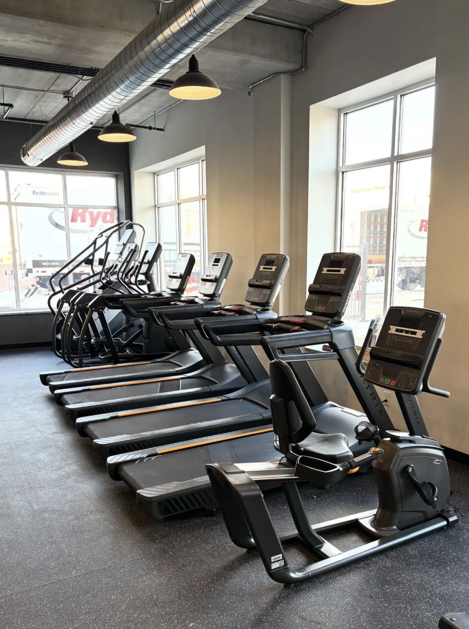 Matrix cardio equipment beside the windows at PKFit Oshkosh
